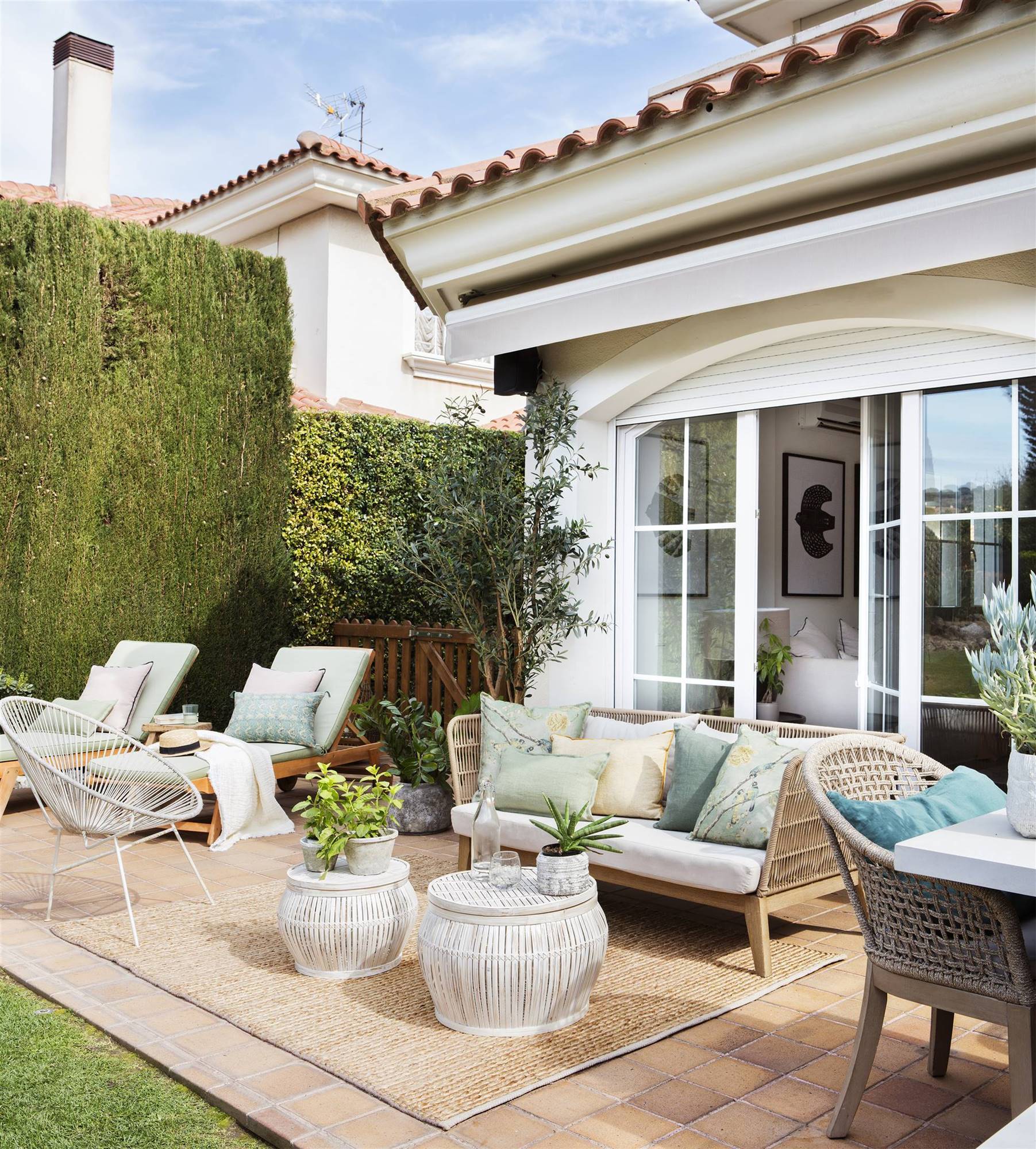 Terraza con cona de estar y solarium